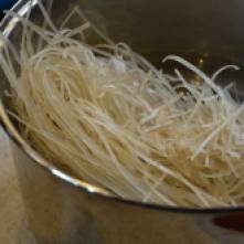 Boil water and add to pot; submerge noodles and let sit...