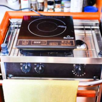 This is our propane stove with our induction hot plate sitting on top.